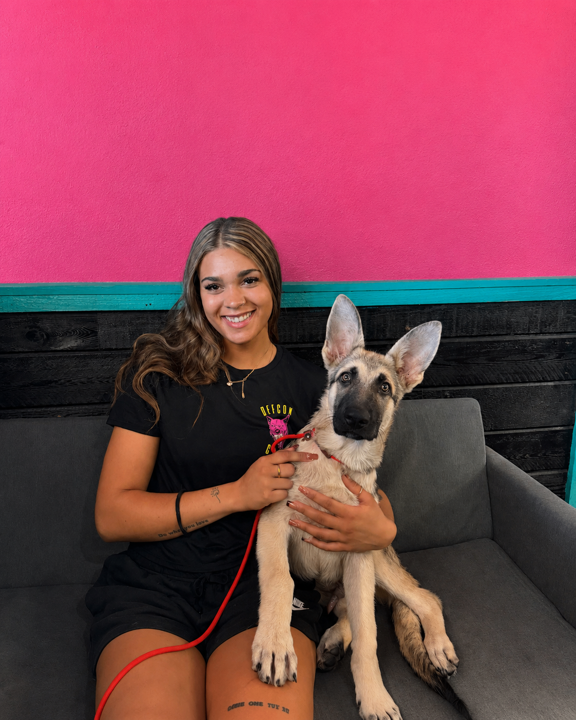 Cat Jackson with a young German Shepherd during a board and train session